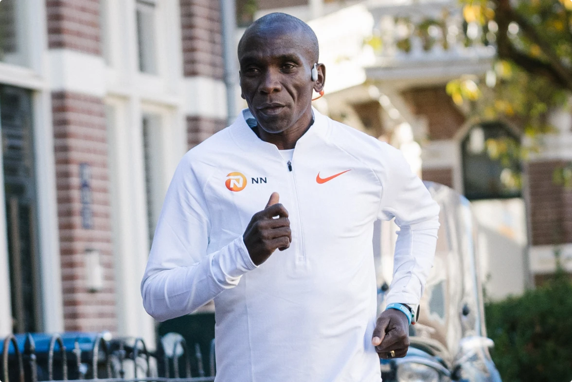 eliud kipchoge running with shokz headphones united states